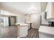 Bright kitchen with modern appliances open to the living room and balcony at 50 S Boulder Cir # 5022, Boulder, CO 80303