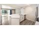 Renovated kitchen featuring stainless steel appliances and an open layout to a living area at 50 S Boulder Cir # 5022, Boulder, CO 80303