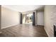 Inviting living room featuring stylish wood floors, neutral walls, and a sliding glass door at 50 S Boulder Cir # 5022, Boulder, CO 80303