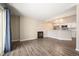 Spacious living room featuring an open floor plan, fireplace, and seamless flow to the kitchen at 50 S Boulder Cir # 5022, Boulder, CO 80303
