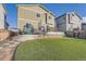 Backyard with a well-kept lawn, a multi-level deck area, and easy access via concrete steps at 3549 Swabuck Pl, Castle Rock, CO 80109