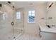 Modern bathroom with marble shower and double vanity at 1885 Hickory Ave, Erie, CO 80516