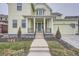 Front entrance with stairs leading to a covered porch at 1885 Hickory Ave, Erie, CO 80516