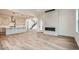 Modern kitchen with a large island, white cabinets, and quartz countertops at 1885 Hickory Ave, Erie, CO 80516