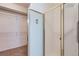 Bright bathroom featuring a tiled shower with glass doors and view of a closet at 4222 S Blackhawk Cir # 6G, Aurora, CO 80014