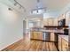 Open-concept kitchen with a view into the living room, creating a perfect entertaining space at 4222 S Blackhawk Cir # 6G, Aurora, CO 80014