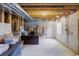 Unfinished basement with exposed beams and concrete walls, ready for customization at 7700 Bison Ct, Littleton, CO 80125