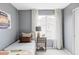 Cozy bedroom featuring modern decor and natural light at 7700 Bison Ct, Littleton, CO 80125