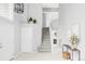 Grand foyer with soaring ceilings, staircase, and stylish decor at 7700 Bison Ct, Littleton, CO 80125