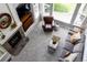 Open living room with fireplace, large windows, and comfortable seating at 7700 Bison Ct, Littleton, CO 80125