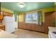 Spacious kitchen offering wood cabinets and a window with natural light at 6960 S Penrose Ct, Centennial, CO 80122