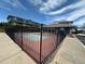 Gated community pool area with ample seating and a well-maintained deck at 12036 Monaco St, Brighton, CO 80602