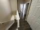 An upstairs hallway offering seamless transition between rooms and great flow at 12036 Monaco St, Brighton, CO 80602