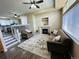 Inviting living room features a cozy fireplace and elegant decor at 12036 Monaco St, Brighton, CO 80602