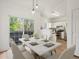 Dining area with a stylish modern table and bright natural light at 19246 E Carolina Pl # 102, Aurora, CO 80017