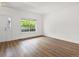 Spacious living room with hardwood floors and lots of natural light at 19246 E Carolina Pl # 102, Aurora, CO 80017