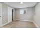 Spacious bedroom with carpet flooring and sliding door to closet at 9525 Damon Dr, Northglenn, CO 80260