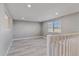 Bright living room with hardwood floors and neutral walls at 9525 Damon Dr, Northglenn, CO 80260