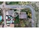 Aerial view showcasing the property layout, landscaping, patio, and surrounding neighborhood at 7835 Valley View St, Louviers, CO 80131
