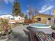 Backyard with an above-ground pool, RV, and outdoor seating area, perfect for summer fun at 7835 Valley View St, Louviers, CO 80131