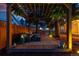 Backyard patio featuring a pergola and an outdoor lounge area, perfect for entertaining at 7835 Valley View St, Louviers, CO 80131