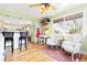 Cozy living room with bar seating and decorative chairs at 7835 Valley View St, Louviers, CO 80131