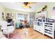 Bright office with ample storage, large window, and light-colored walls at 7835 Valley View St, Louviers, CO 80131
