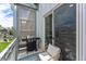 Cozy balcony with a grill and comfortable seating, ideal for relaxing outdoors with an urban view at 2550 Lawrence St # Rb308, Denver, CO 80205