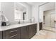 Sleek bathroom featuring a quartz countertop vanity with soft-close cabinets and drawers at 2550 Lawrence St # Rb308, Denver, CO 80205