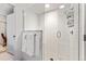 Contemporary bathroom with a glass-enclosed shower and subway tile at 2550 Lawrence St # Rb308, Denver, CO 80205