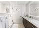 Modern bathroom featuring a glass-enclosed shower, vanity, and sleek lighting at 2550 Lawrence St # Rb308, Denver, CO 80205