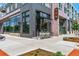 Coffee shop with outdoor seating near a building's entryway at 2550 Lawrence St # Rb308, Denver, CO 80205