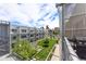 Enjoy an exterior view from the patio featuring green space and views of Denver's city skyline at 2550 Lawrence St # Rb308, Denver, CO 80205