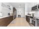 Spacious kitchen with stainless steel appliances and light wood floors at 2550 Lawrence St # Rb308, Denver, CO 80205
