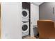 Conveniently located stacked washer and dryer in a modern closet space at 2550 Lawrence St # Rb308, Denver, CO 80205