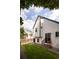 Backyard featuring a well-maintained lawn, fence, and stairs at 11586 Chase Way, Westminster, CO 80020