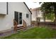 Charming backyard with grass, stone landscaping, and a patio at 11586 Chase Way, Westminster, CO 80020
