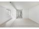 Bright basement featuring neutral carpet, white walls, and natural light at 11586 Chase Way, Westminster, CO 80020