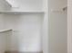 Empty closet featuring neutral paint, carpet, shelving and a closet rod for hanging clothes at 11586 Chase Way, Westminster, CO 80020
