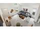 Aerial view of a bright living room with a gray sectional, a patterned rug, and plenty of natural light at 11586 Chase Way, Westminster, CO 80020