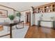 Office features wood floors, built-in bookcases, accent lighting, and modern decor at 2 University Ln, Greenwood Village, CO 80121