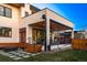 Modern home features a stylish covered patio and backyard at 2501 Vrain St, Denver, CO 80212