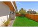 Beautiful backyard featuring a lush green lawn and partial view of a recreational park at 2501 Vrain St, Denver, CO 80212