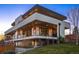 Modern home with clean lines, open balcony, and a well-maintained yard at 2501 Vrain St, Denver, CO 80212