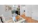 Bright home office featuring hardwood floors, a glass desk, and ample natural light at 2501 Vrain St, Denver, CO 80212