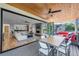 Open floor plan with living area extending to an outdoor deck for entertaining at 2501 Vrain St, Denver, CO 80212