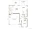 A detailed floor plan showcasing the layout of the main level including the kitchen, garage, and living spaces at 19080 E 96Th Pl, Commerce City, CO 80022