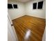 Spacious bedroom with hardwood floors and ample natural light at 1851 S Perry Way, Denver, CO 80219