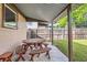 Covered patio with picnic table and benches at 1851 S Perry Way, Denver, CO 80219