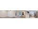 Inviting condo with a seamless transition from the living room to the modern kitchen, enhancing the sense of space at 3315 S Ammons St # 103, Lakewood, CO 80227